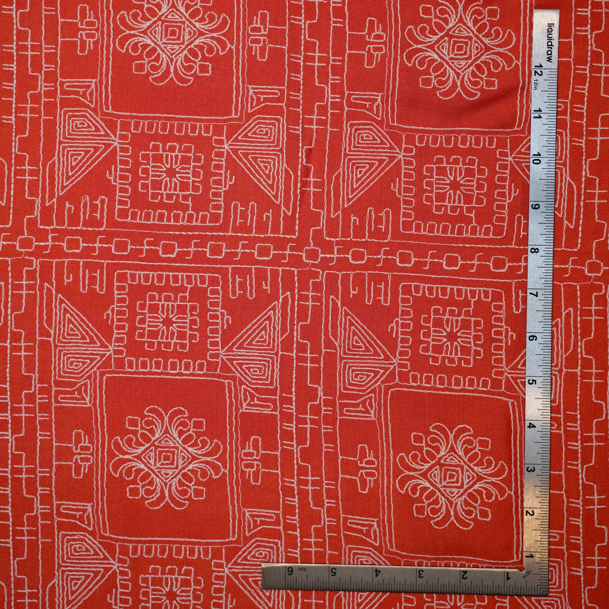 Vibrant Orange with white embroidery geometric pattern